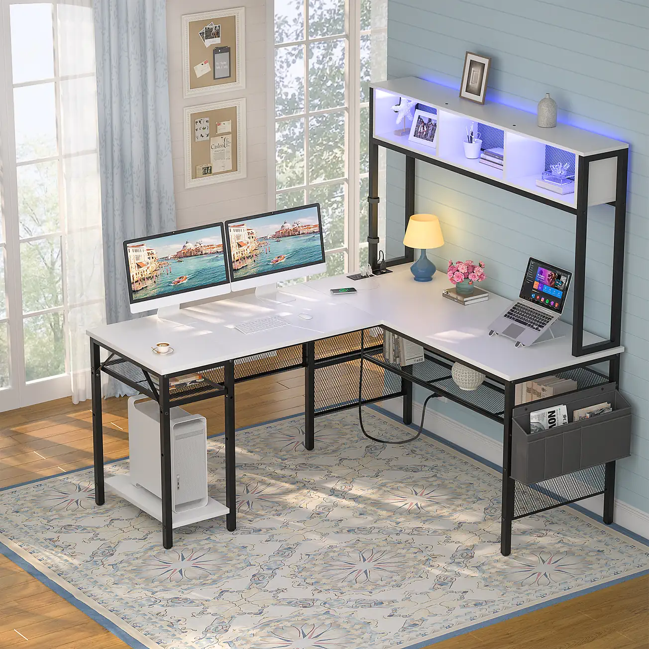 White Reversible Gaming Desk Lifestyle Setup Lifestyle scene of an all white L-shaped gaming desk with smart LED hutch and side storage pocket