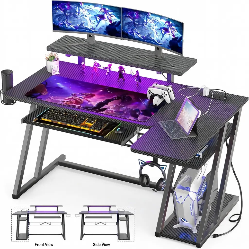 All-black L-shaped gaming desk with carbon fiber texture surface, built-in LED lighting, and keyboard tray