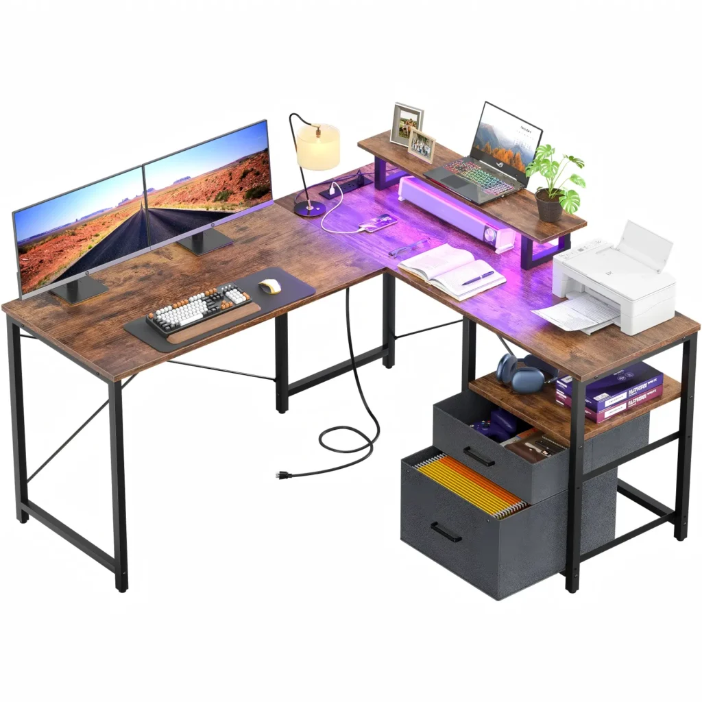 Rustic brown L-shaped computer desk with smart RGB LED light strip, built-in recessed power strip, and office file storage drawers.