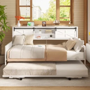 white metal daybed frame with pulled out trundle bed